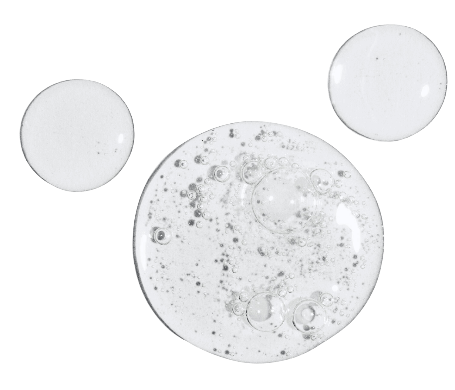 Three clear liquid drops of THIRSTY Hydrating Serum on a white background