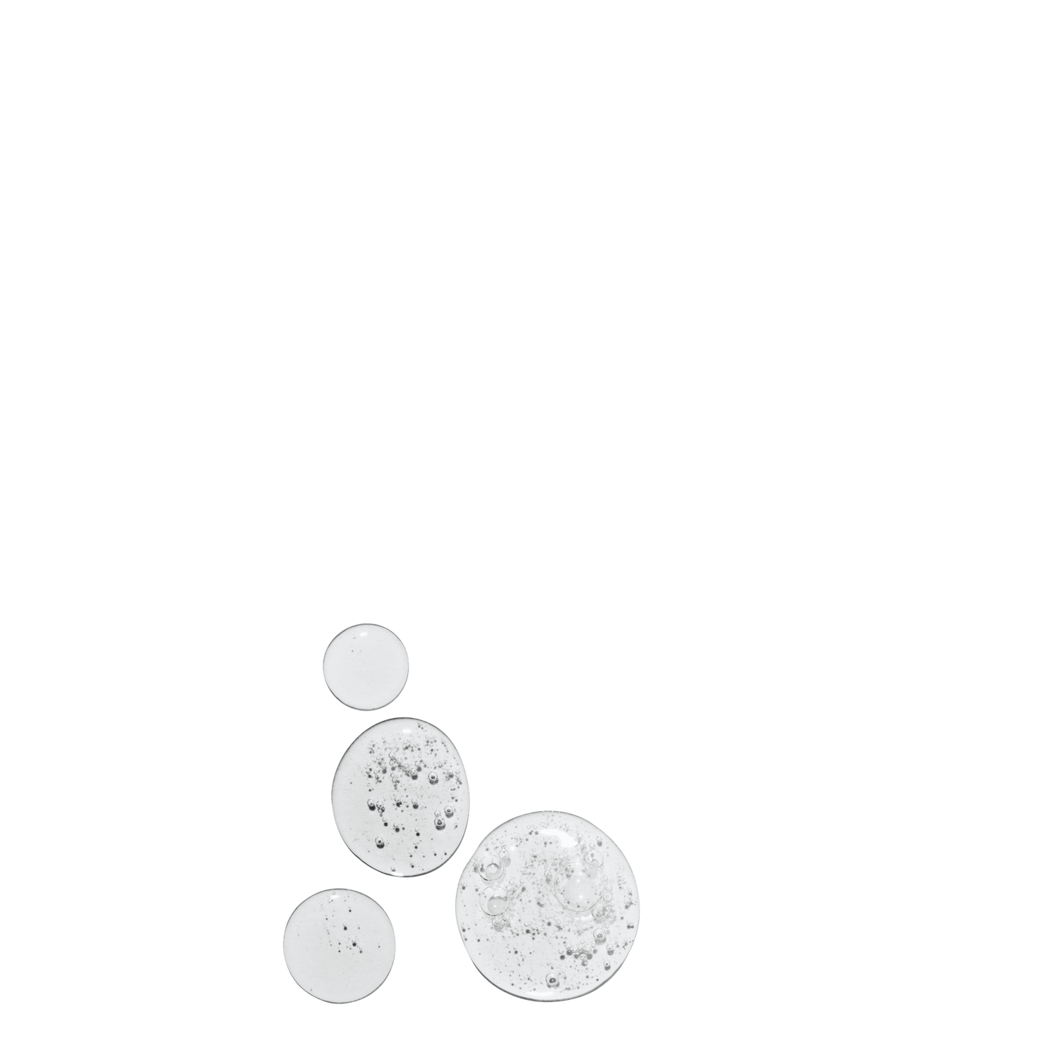 Several liquid drops of THIRSTY Hydrating Serum on a white background