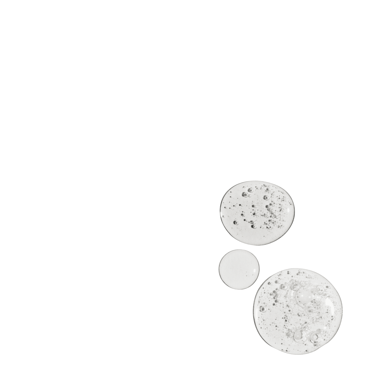 Three clear liquid drops of LUMEN Mandelic Serum on a white background 